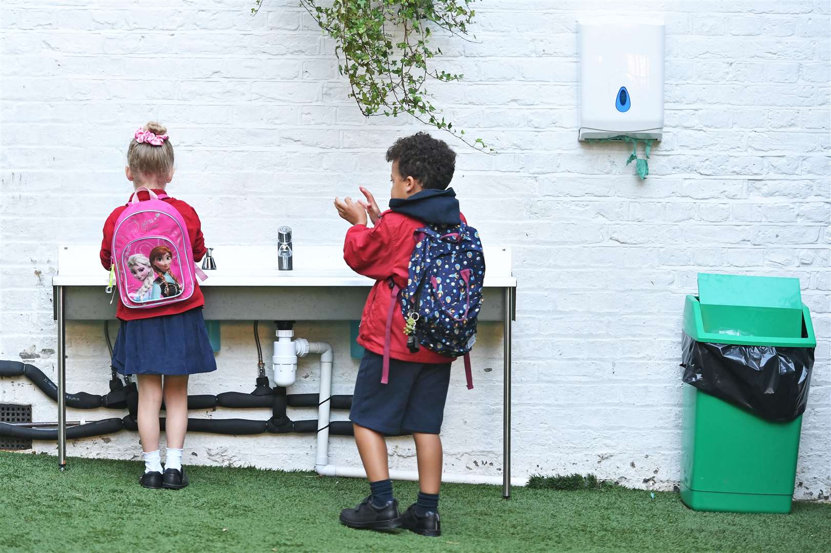 Pupils wash their hands at school (Dominic Lipinski/PA)