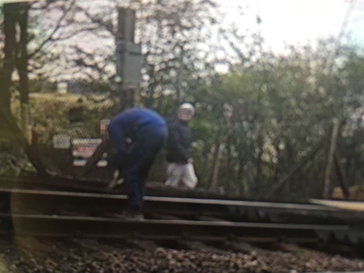 Boys on the railway line at Bewbush, near Crawley, in West Sussex (Network Rail/PA)