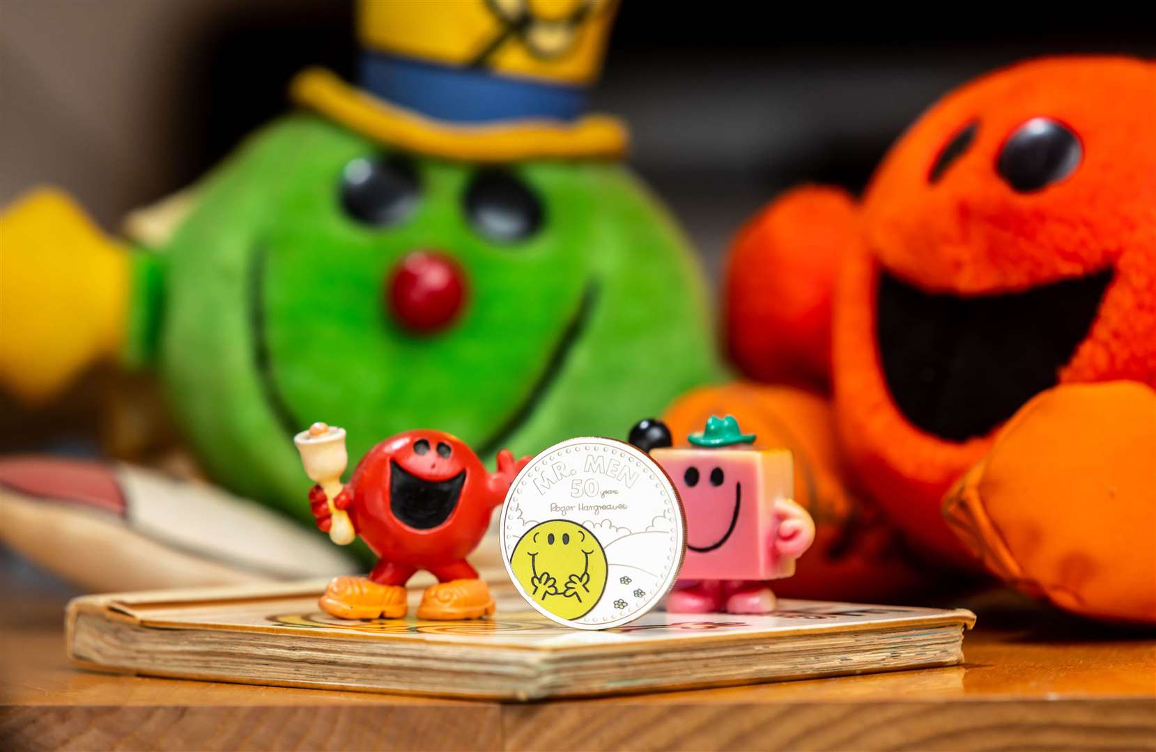 A Mr Happy 50th anniversary colour coin from the Royal Mint (Ciaran McCrickard/PA)