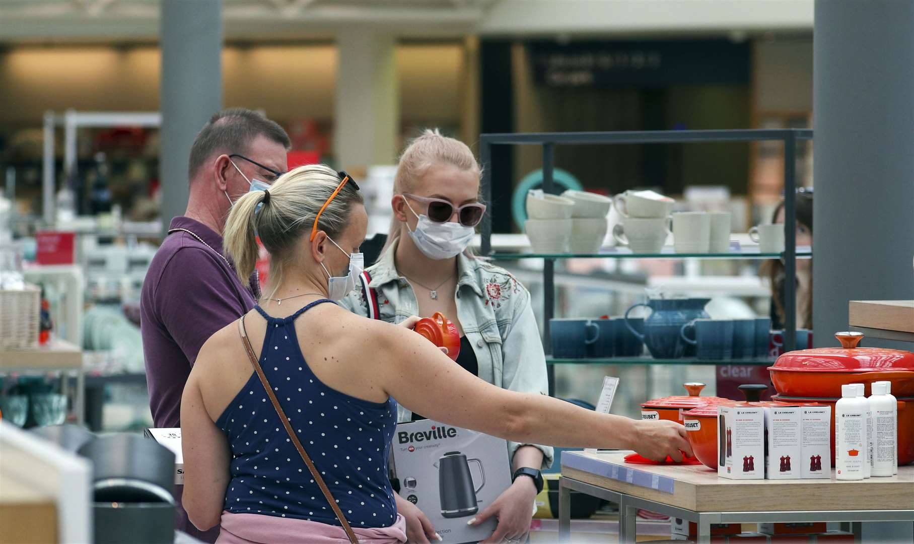 Customers browse in the homeware section at John Lewis in Kingston (Steve Parsons/PA)