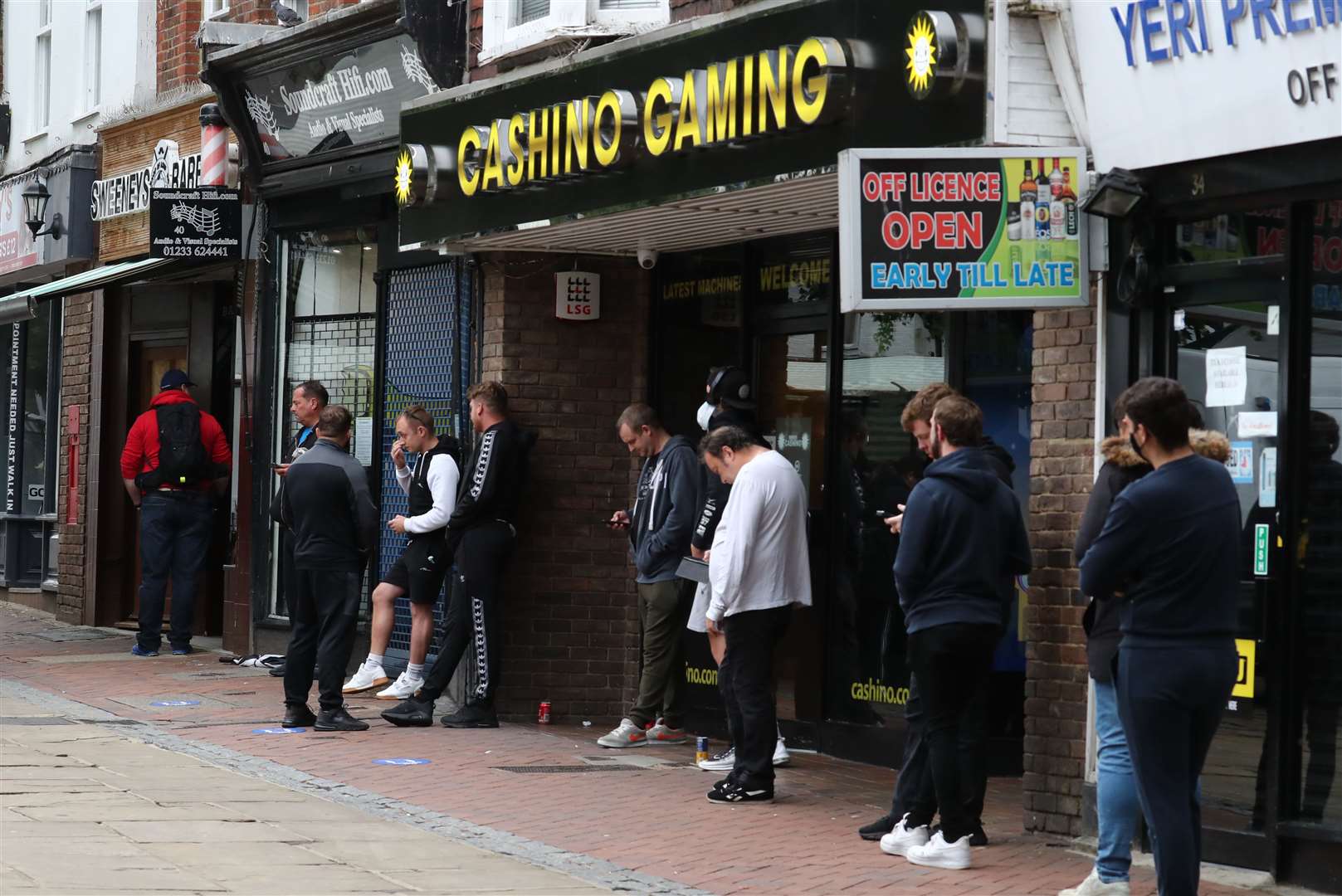 Customers queued early in the morning at a barbers in Ashford, Kent (Gareth Fuller/PA)