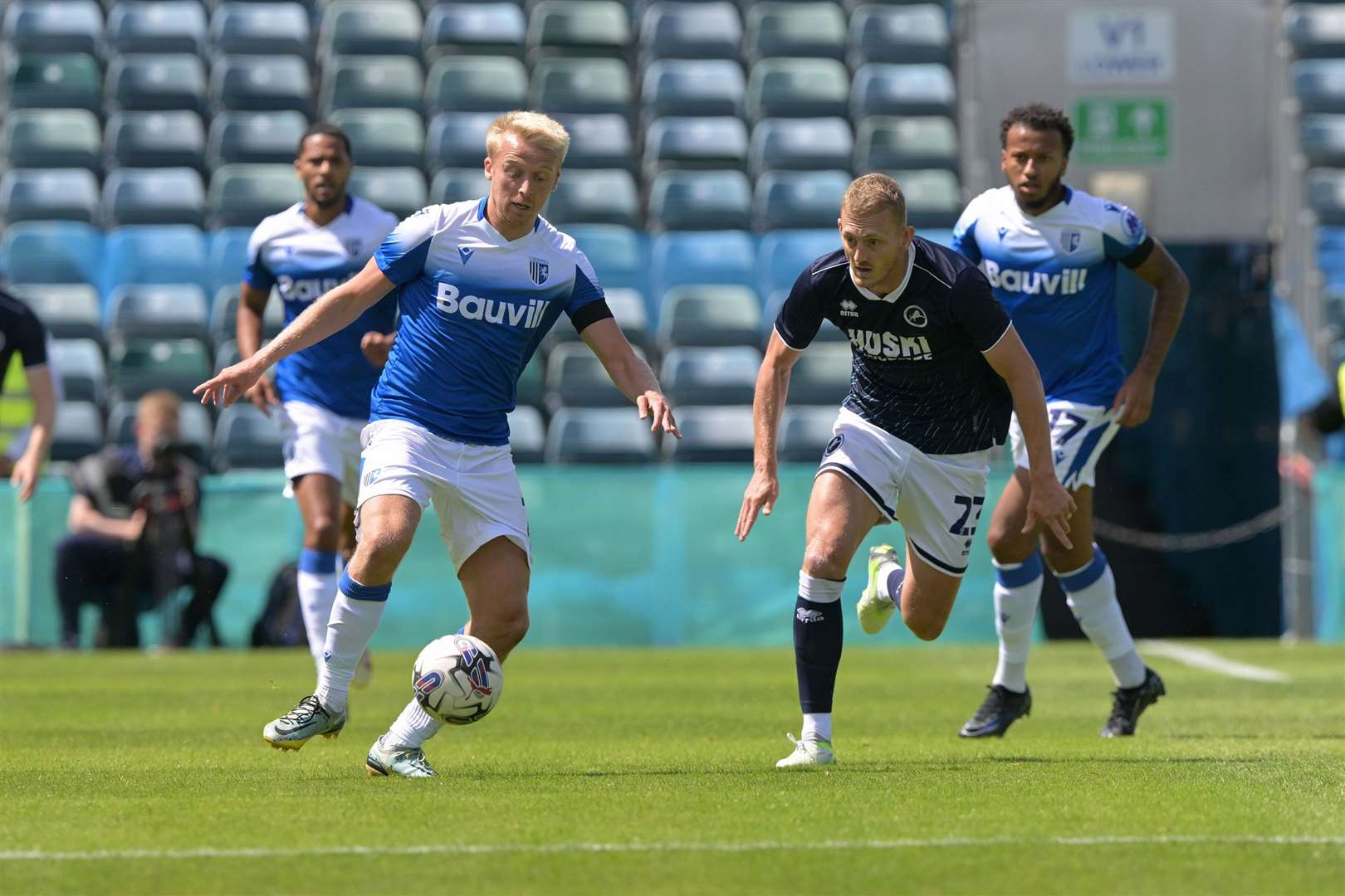 Gillingham's George Lapslie gets away from Millwall's George Saville in last Saturday's friendly at Priestfield Picture: Keith Gillard