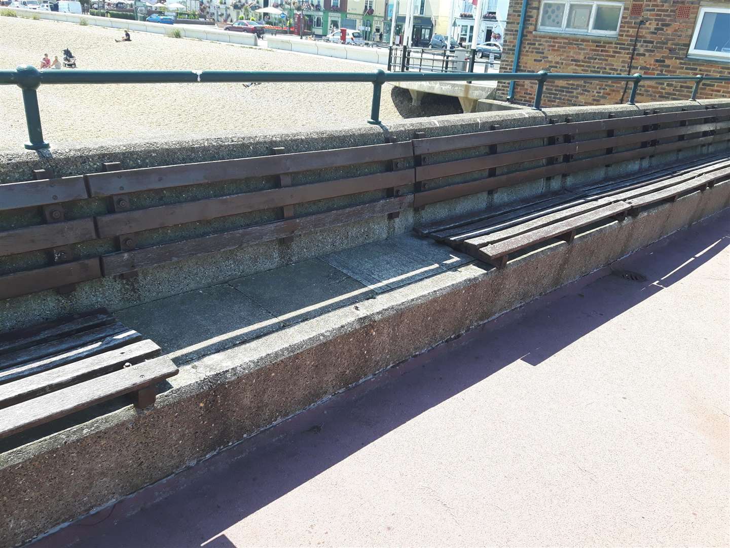 Timbers from the old benches, pictured, are being given away