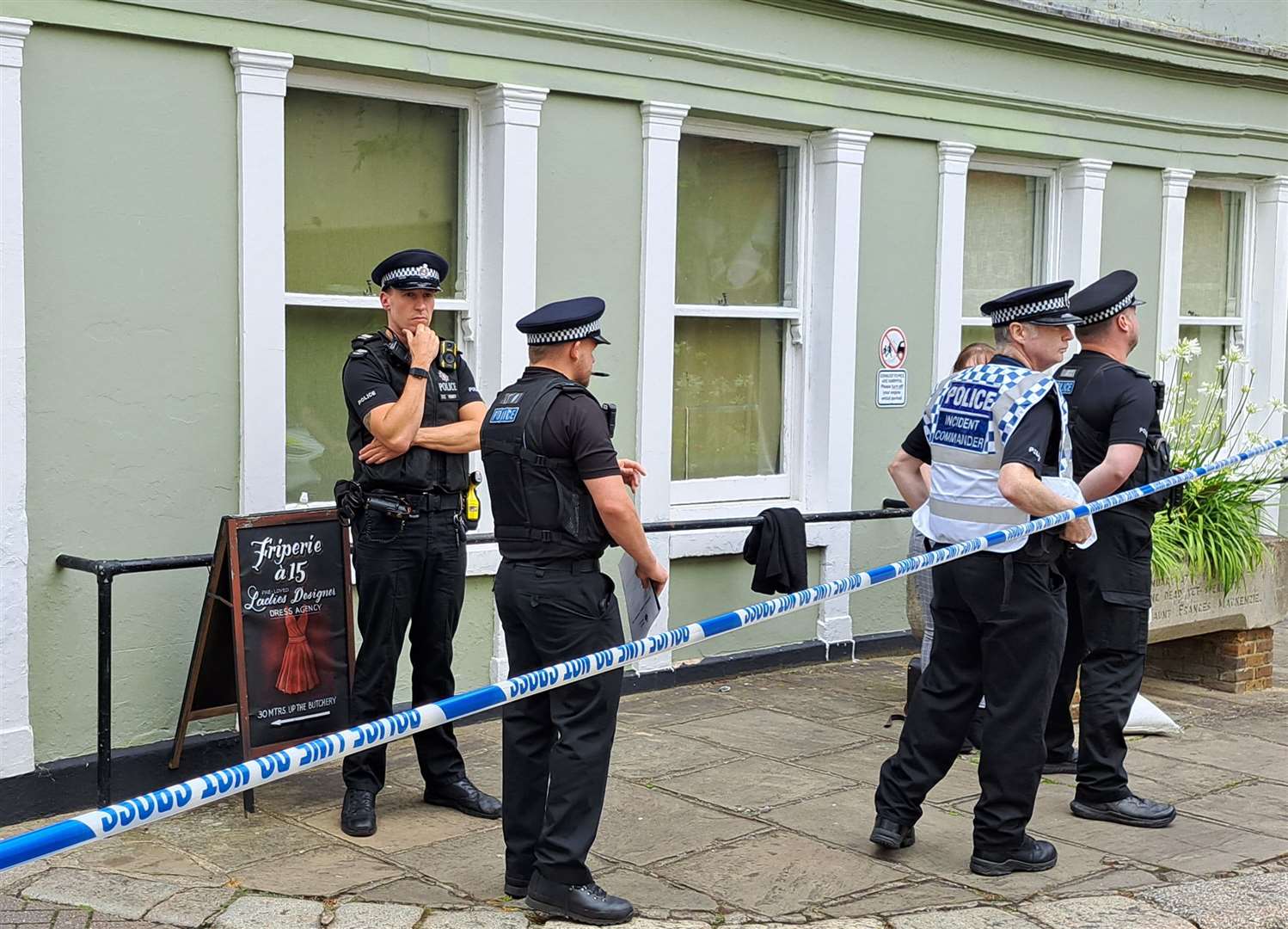 Police established a cordon in Sandwich after the couple were found dead in their home