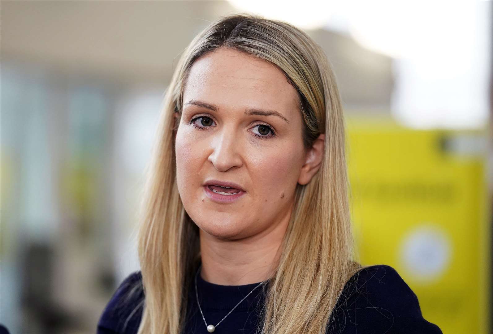 Helen McEntee speaking at Dublin Airport (Brian Lawless/PA)