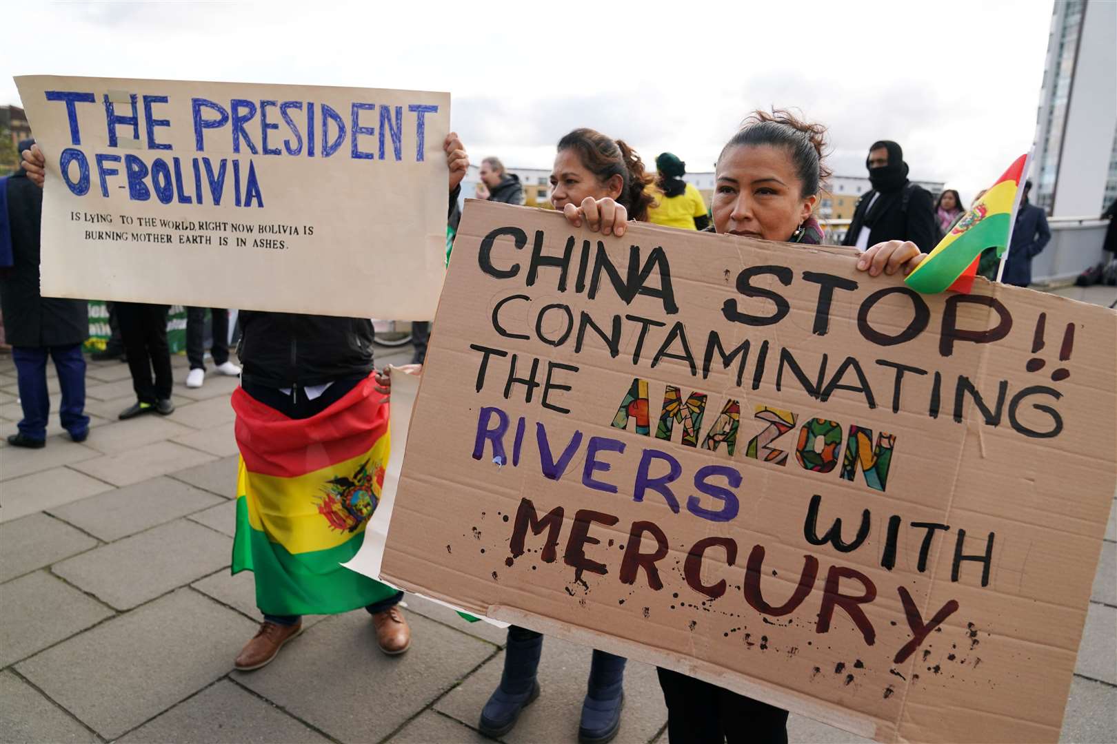 The event has drawn a number of environmental protesters (Andrew Milligan/PA)