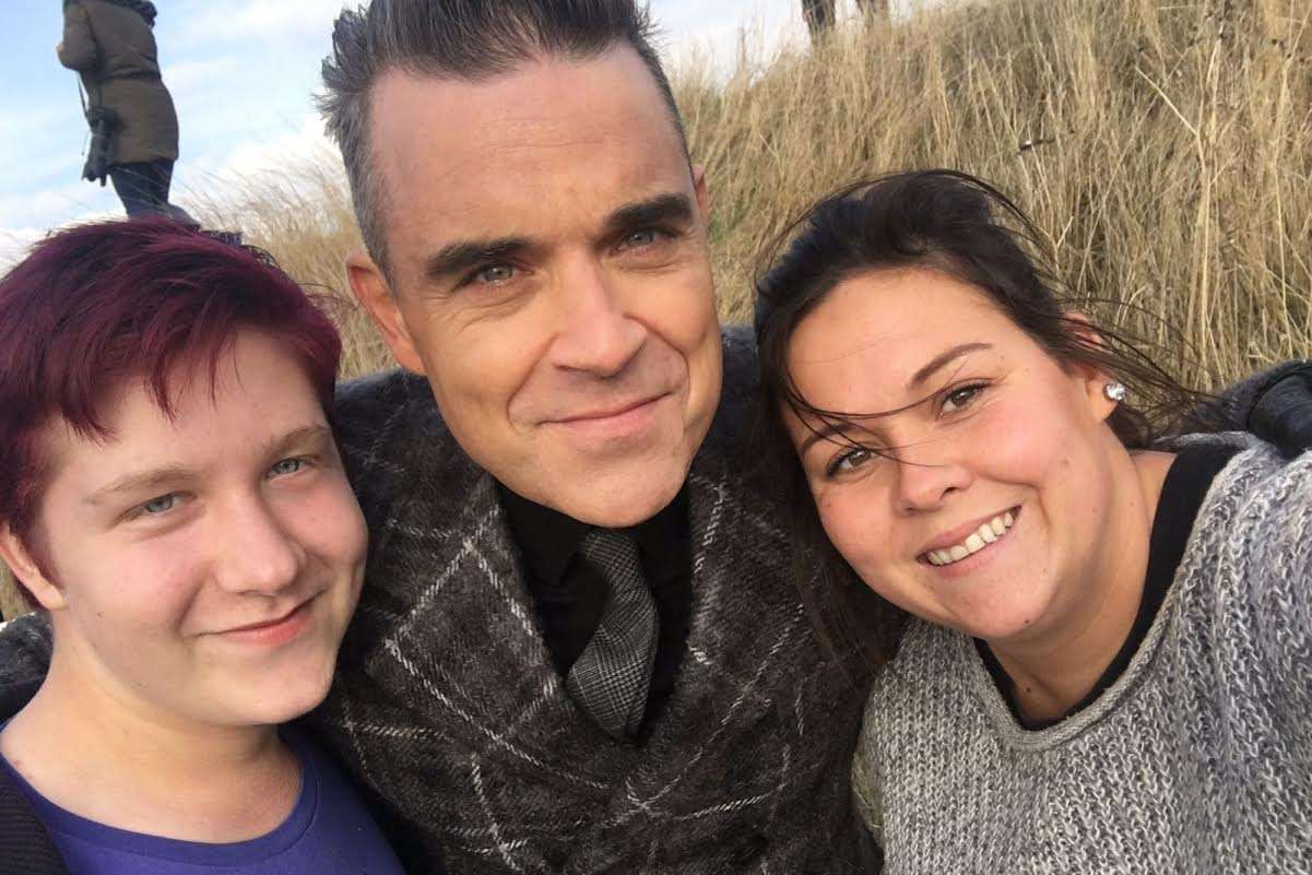 Dan Hughes and Sasha Burgoine with Robbie Williams in Leysdown