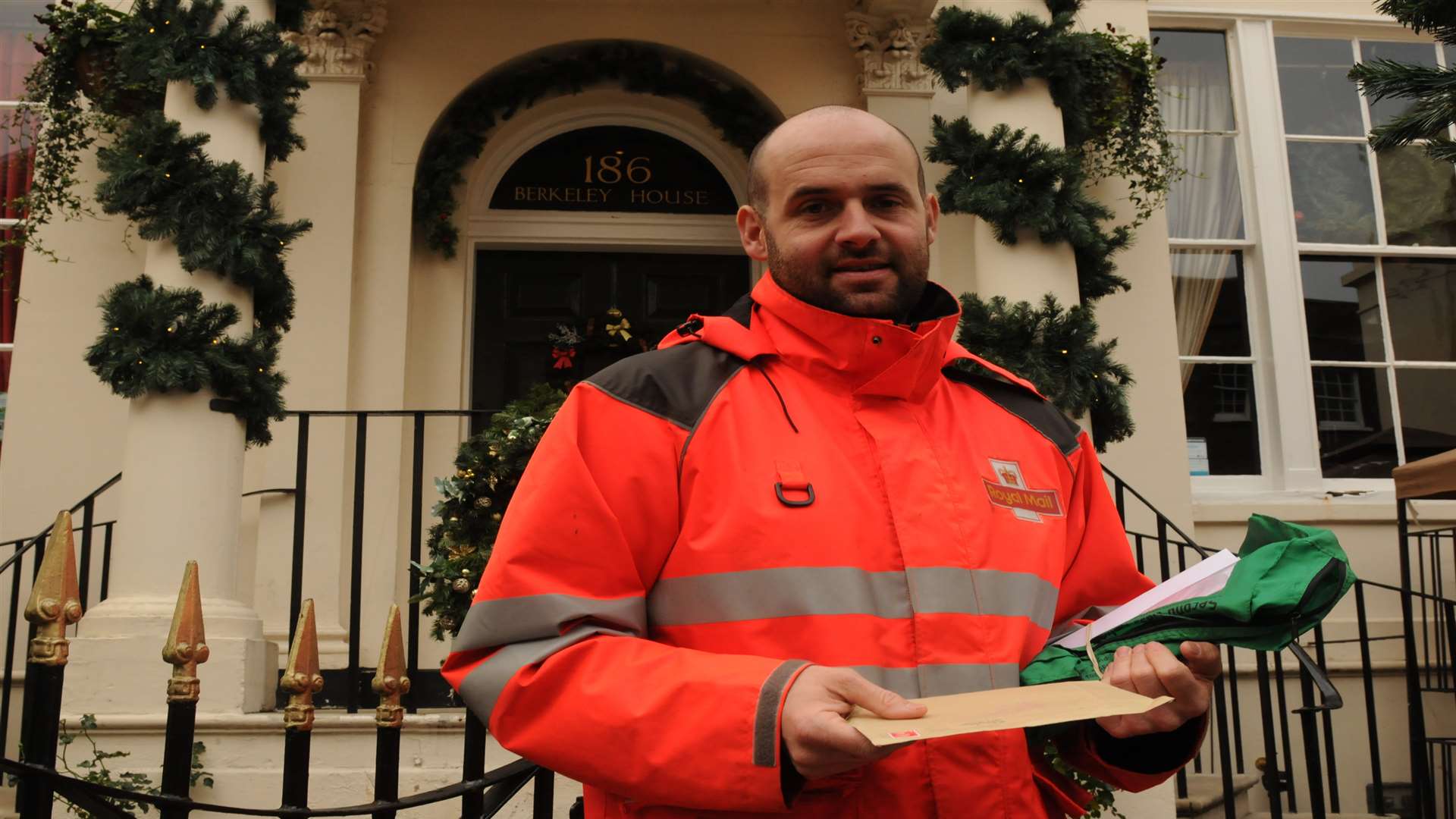 Postman Rob Ashdown on Rochester High Street.