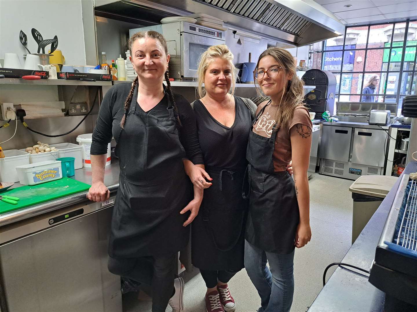 Munch House owner Alexia Noel, centre, with her staff Tatjana Sevciuk, left, and Rosie Ashcroft