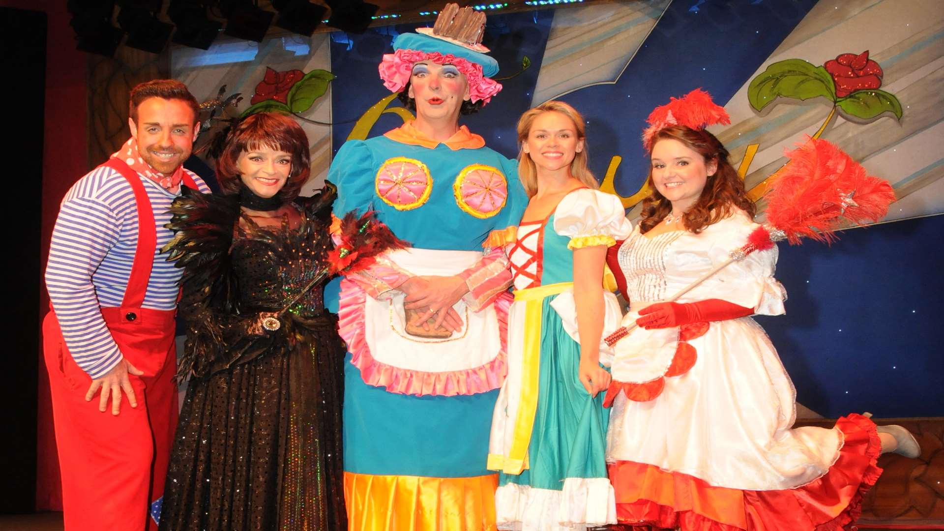 Stevi Ritchie as Potty Pierre, Sue Holderness as Malevolent, Michael Neilson as Dame Dotty Derier, Katy Ray as Beauty, and Sarah Lark as Fairy Formidable.