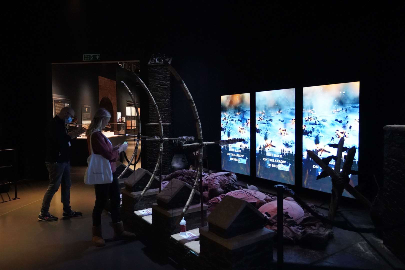 Visitors try out a display during a preview day of the Game of Thrones Studio Tour (Niall Carson/PA)