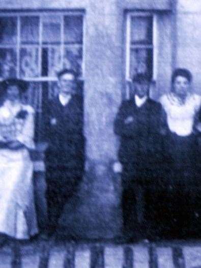 This 1911 photograph, a copy of which was on the wall of the pub, includes what some believe to be a ghostly figure third from left