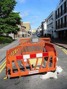 Hole in the road in Tufton Street, Ashford