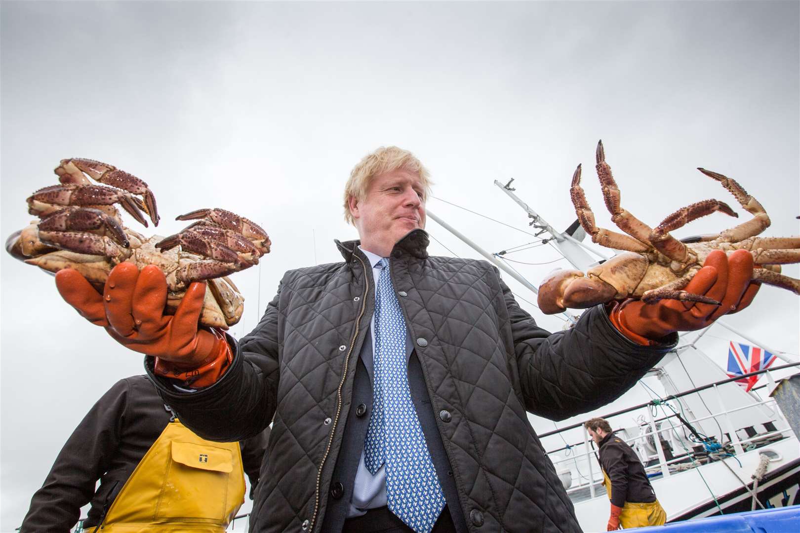 Prime Minister Boris Johnson holds crabs caught on the Carvela at Stromness Harbour, Orkney (Robert Perry/PA)