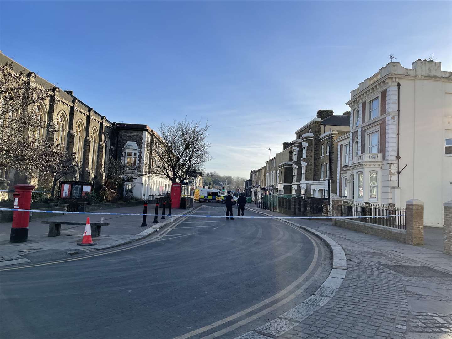 The road was taped off from the Conservative Club