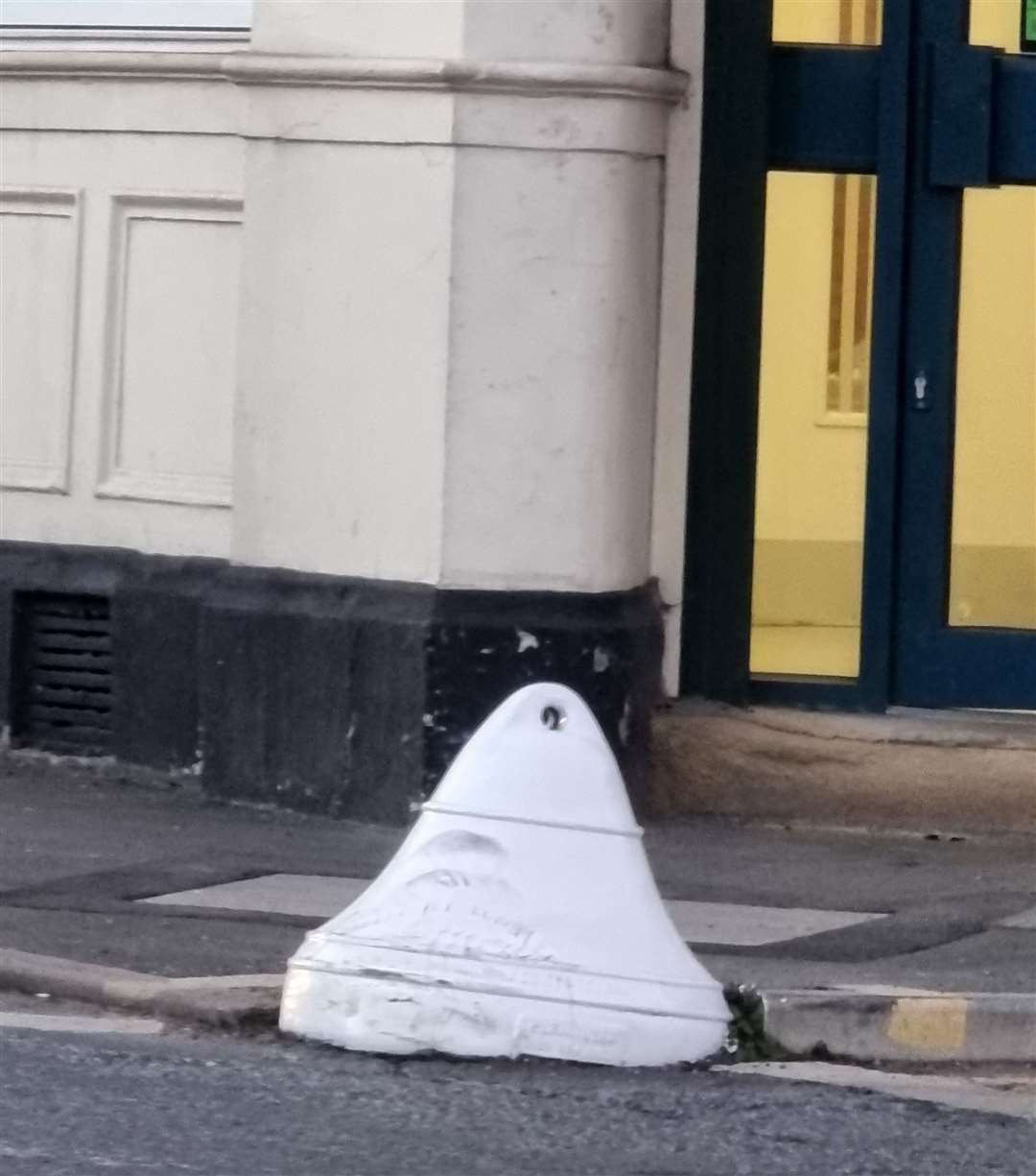 Re-painted white bollard