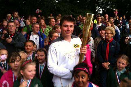 Chris Bury from Invicta Grammar School was the first torchbearer in Mote Park