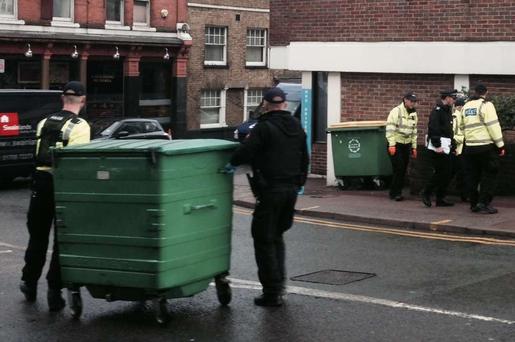 Police carry out a search of the area following the teenager's death