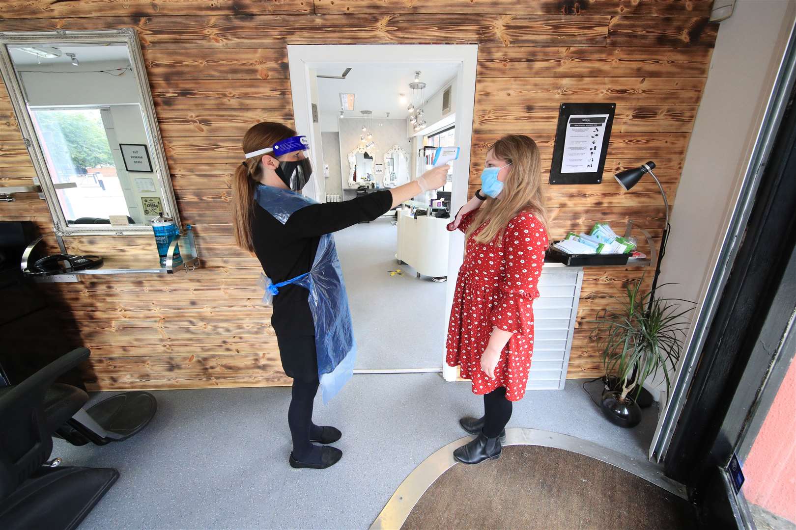 Clients had their temperature taken as they arrived at the reopened The Salon Leeds (Danny Lawson/PA)