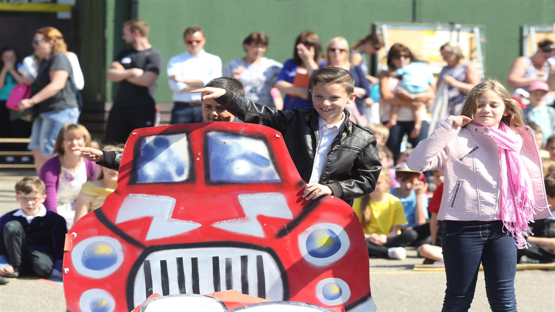 Jake, Kristian and Katie doing a performance of 'Grease Lightening'