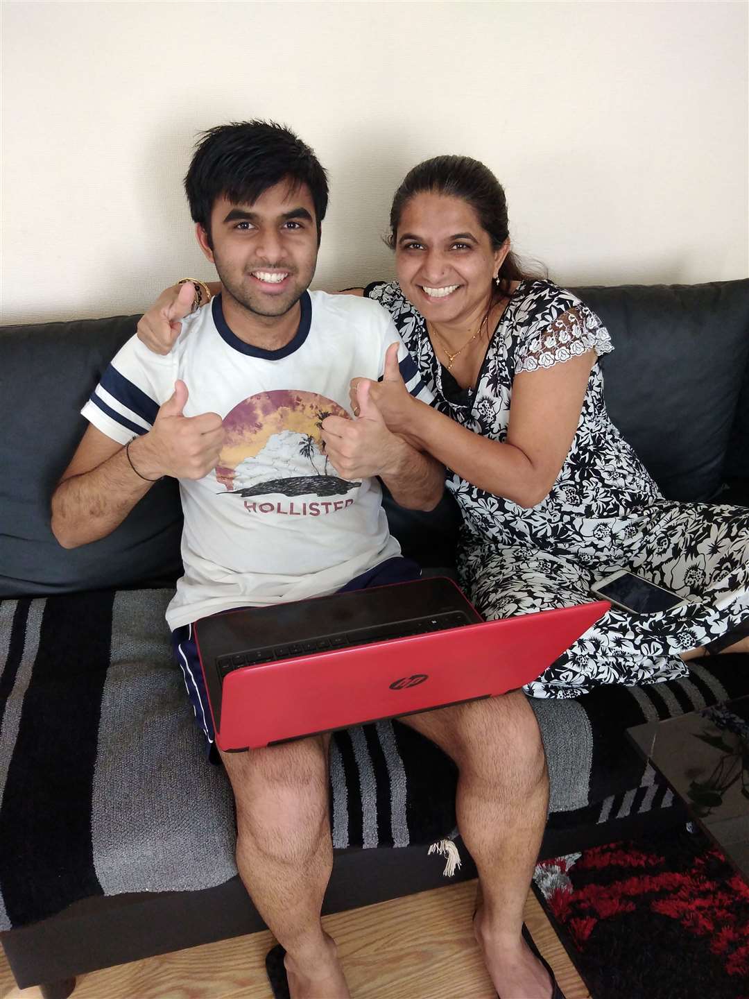 Heet Metha is hugged by his mum as he finds out the Wilmington Grammar for Boys pupil finds out his results