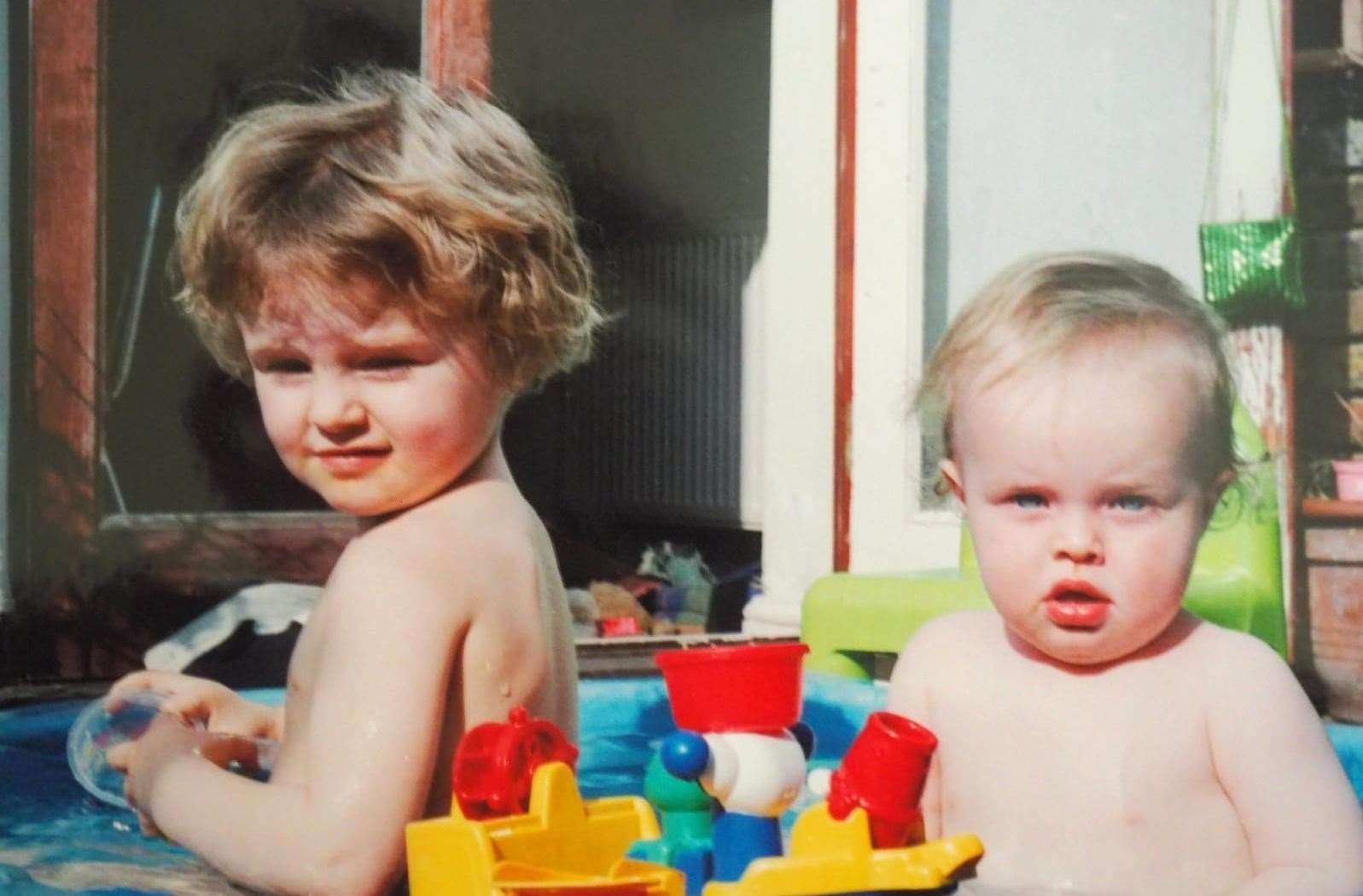 The sisters pictured when they were children