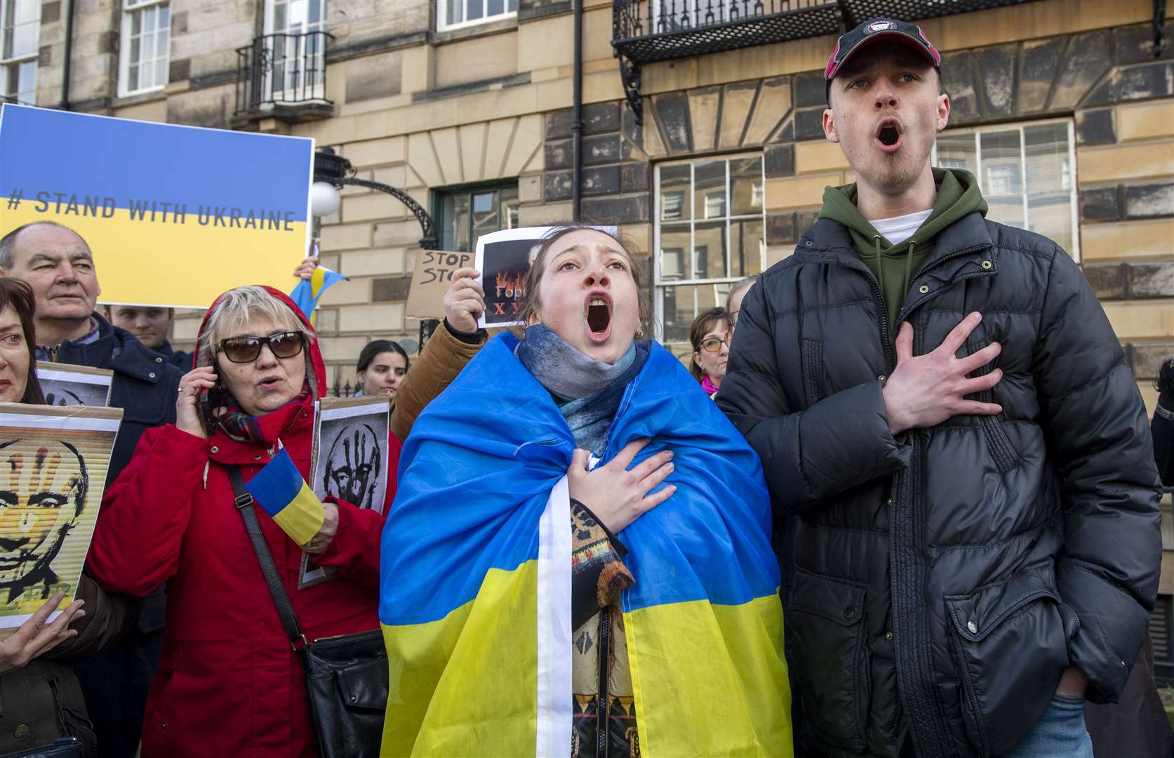 Those taking part sang the Ukrainian national anthem (Lesley Martin/PA)