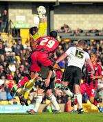 Gillingham's piled on the pressure at Port Vale with keeper Stuart Tomlinson coming under pressure from set-pieces and long-throws from Jack Payne