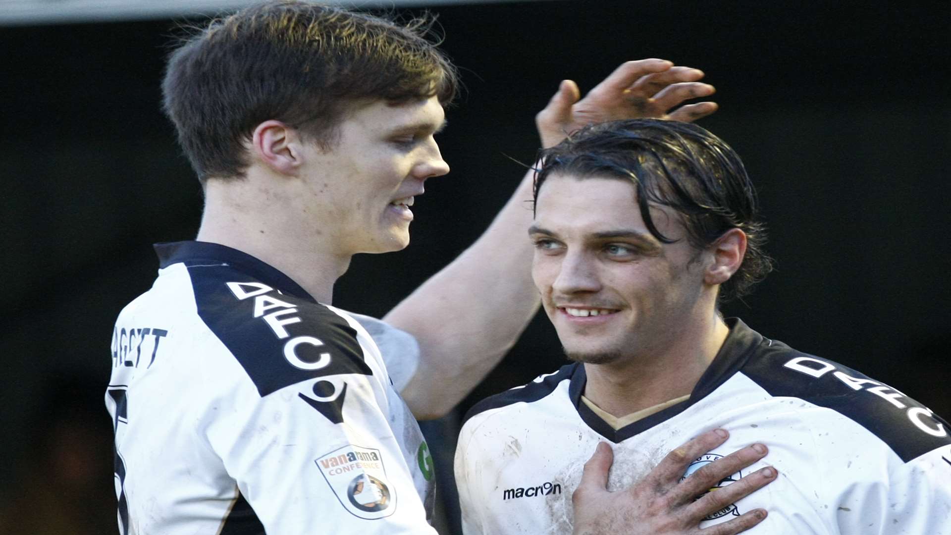 Sean Raggett, left, congratulates Liam Bellamy after his goal.