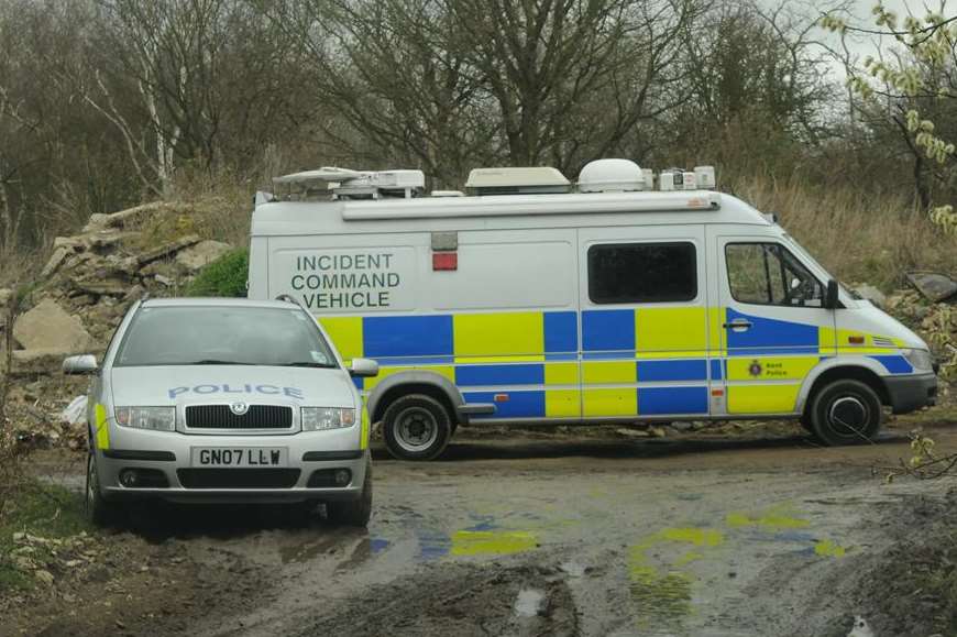 Police vehicles at Kemberland Woods where the body of John Phillips, from Manston, was found