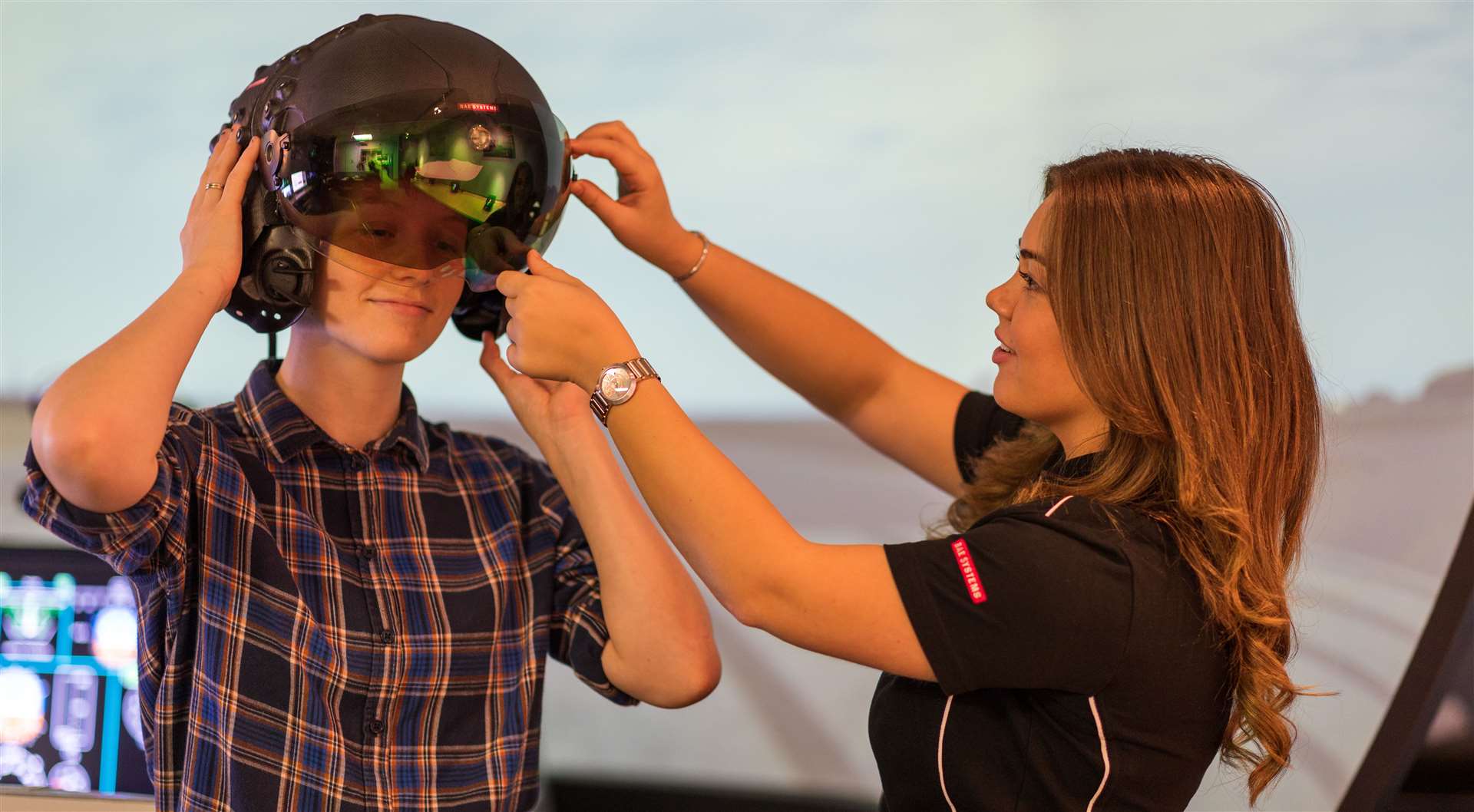 Roxanne and Anais with BAE Systems’ Striker® II helmet.