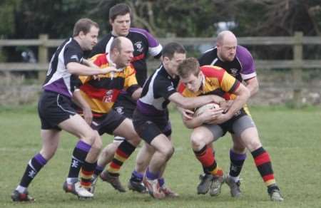 Anchorians, purple and black, get to grips with Ashford in Kent 1