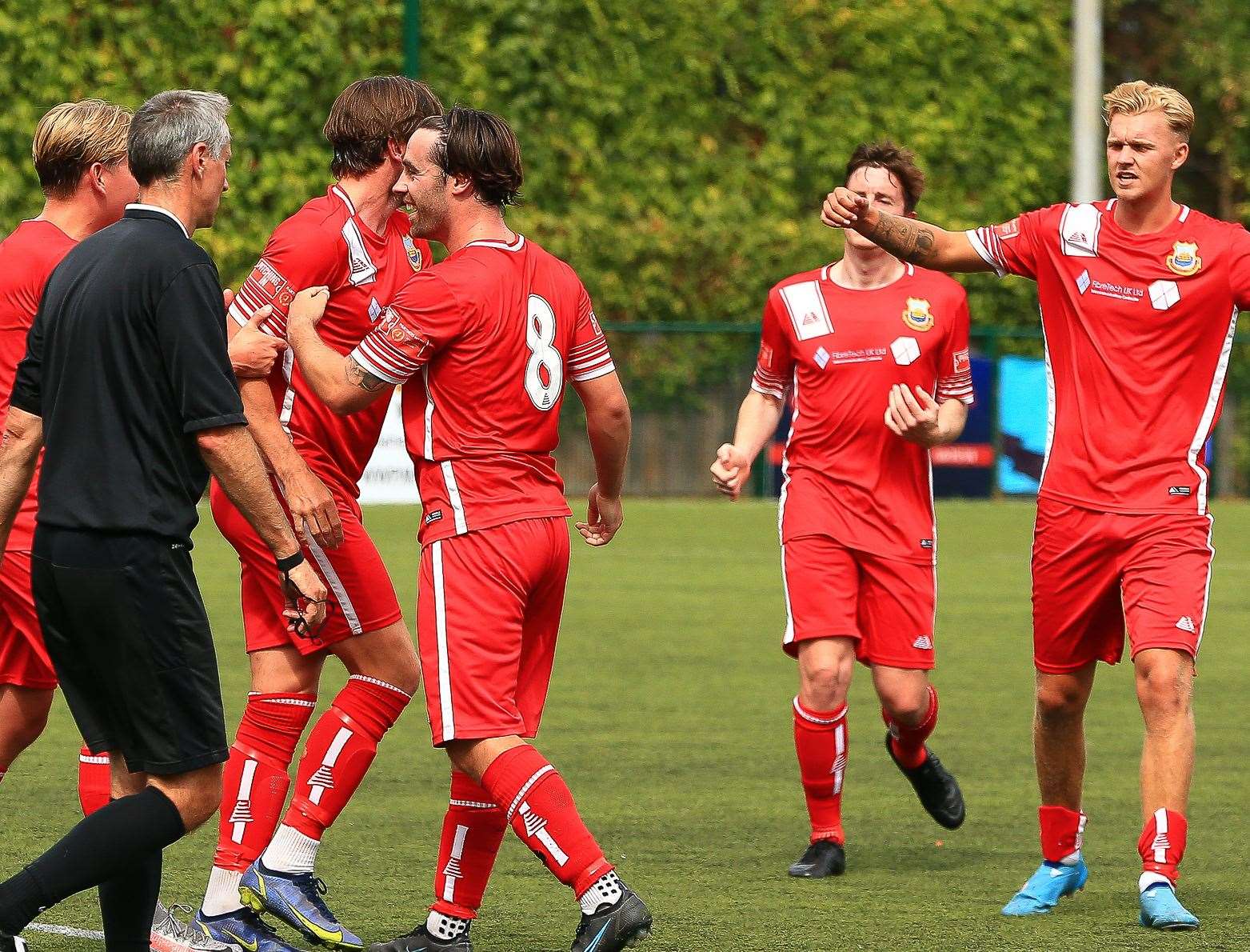 Ryan Flack, number eight, celebrates after scoring the opener for Whitstable at Fisher. Picture: Les Biggs