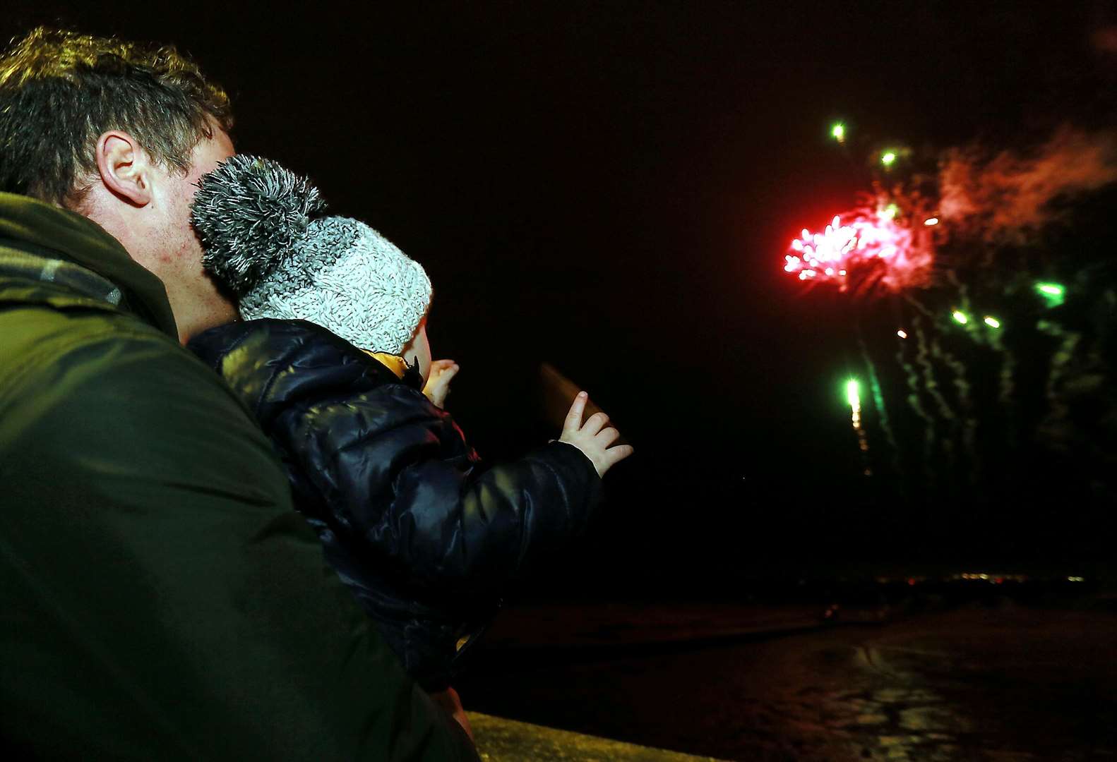 Young and old loved the free fireworks display at Queenborough's Christmas lantern parade on Sunday. Picture: Phil Lee