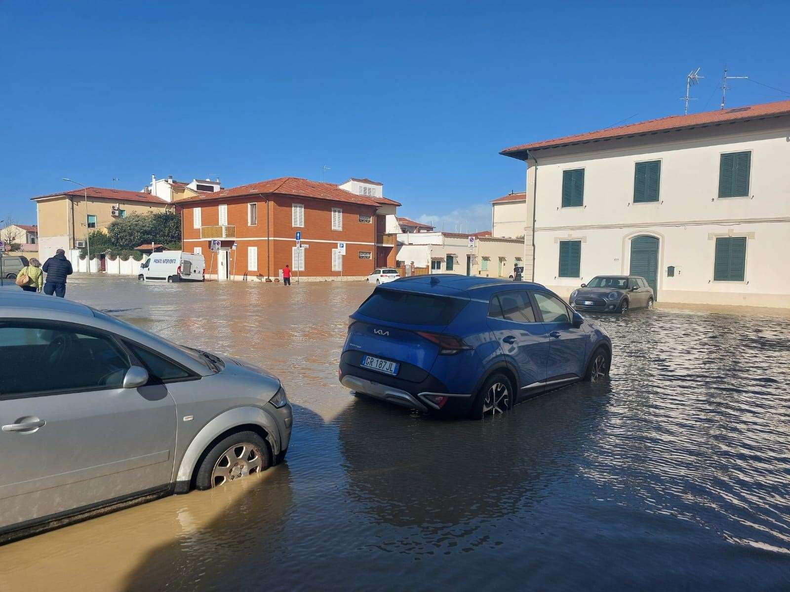 Cars in the town were left partly submerged in water following heavy rainfall (Emma Thom/PA)