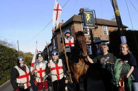 The Unicorn licensees Martin Short and Shirley Wooldridge welcome St George to the start of their beer festival on Friday.