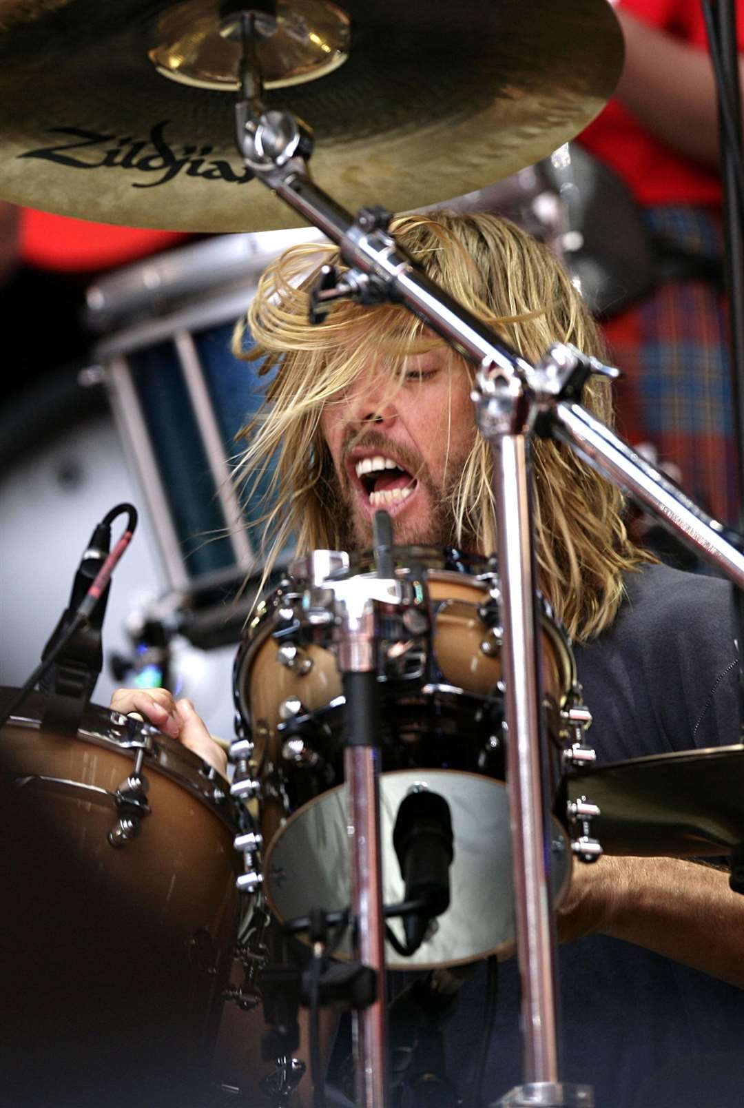 Taylor Hawkins performs during the Live Earth charity concert at Wembley Stadium, London (PA)