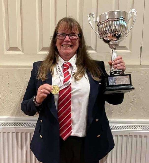 Deal angler Michelle Spragg with her gold medal and the winning trophy from the Sea Angling Liaison Committee Home Internationals
