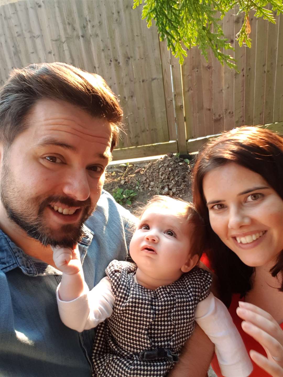 Margarida Cibrao-Roque with her mum Joana Cibrao and dad Paulo Roque (Joana Cibrao/PA)