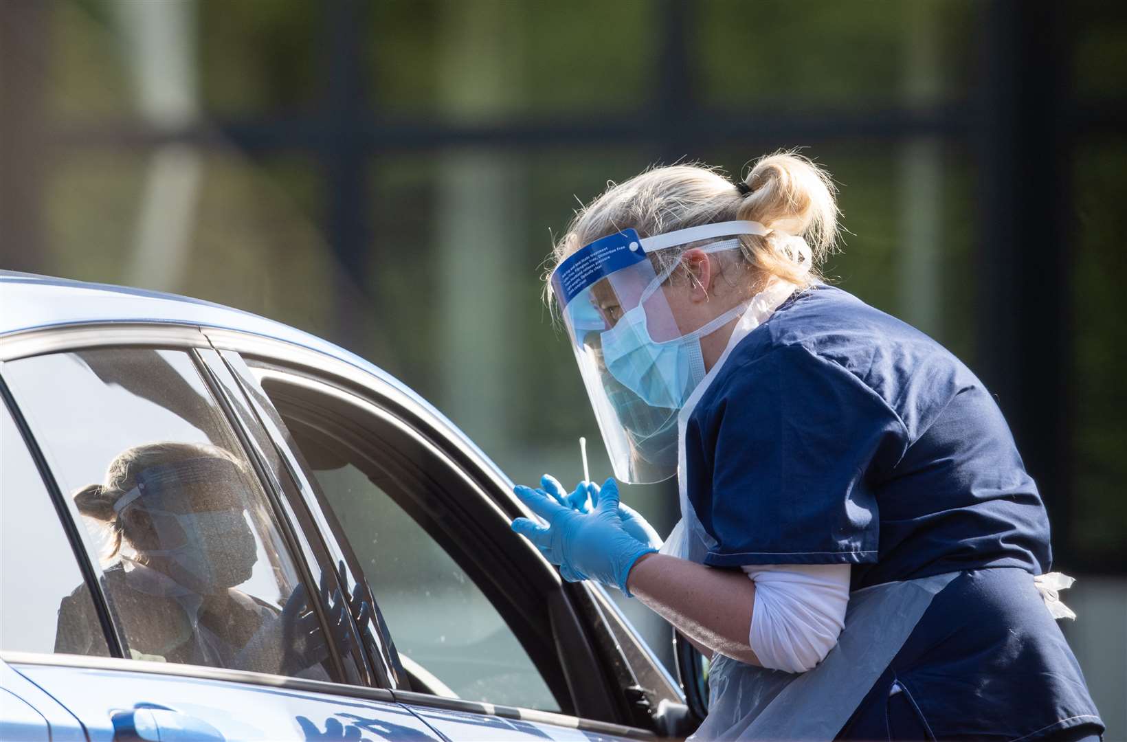 NHS staff carry out coronavirus tests at a facility in Lincoln (Joe Giddens/PA)