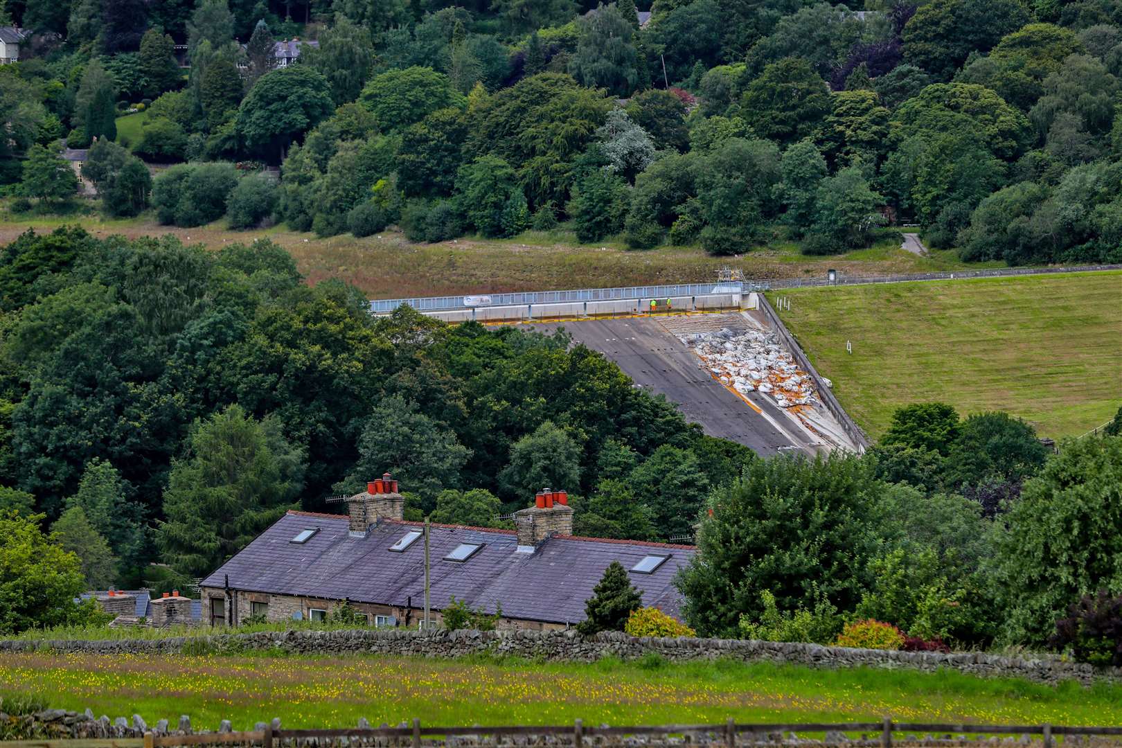 Toddbrook Reservoir came close to collapse, with the residents of Whaley Bridge village, which lies beneath it, evacuated (Peter Byrne/PA)