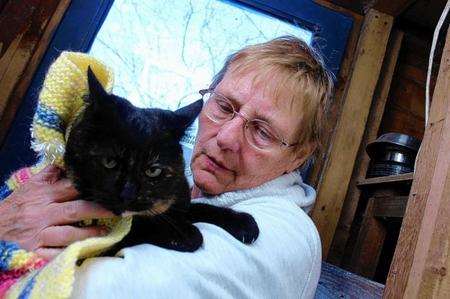 Angela Walder with one of the cats at the Arcadian Cat Hotel