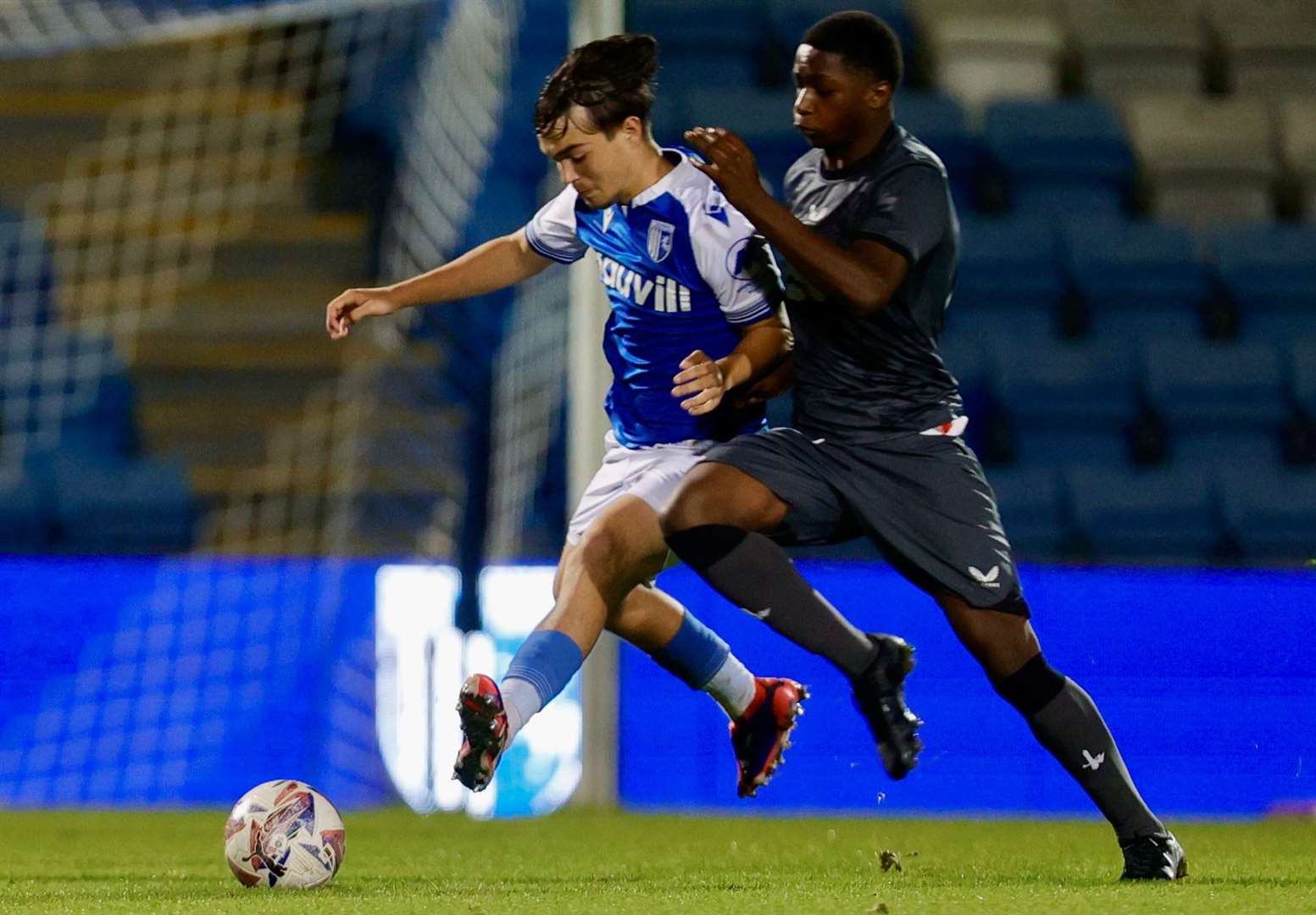 Gillingham's Cruz Beszant is put under pressure by Charlton on Monday. Picture: @Julian_KPI/Gillingham FC