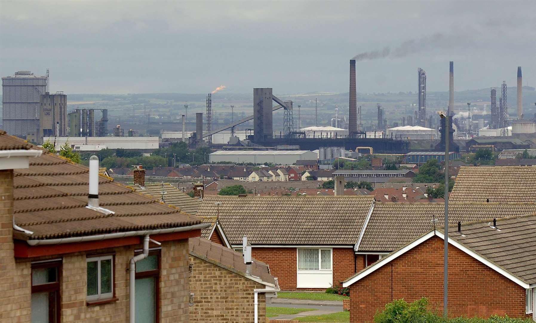 Homes and industry on Teesside, the site of the planned new gas power station featuring carbon capture technology (John Giles/PA)