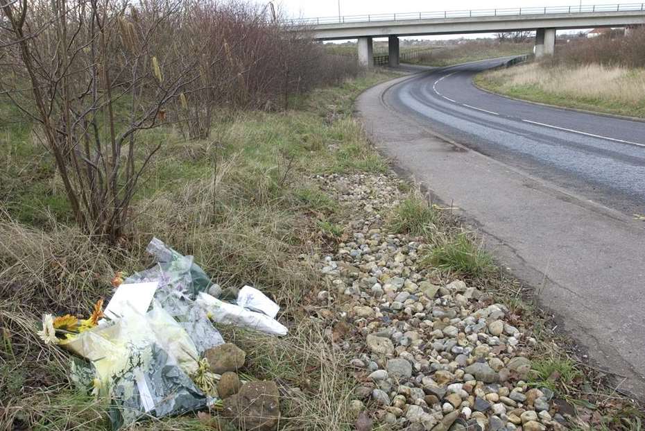 Floral tributes to Adam Scott at the scene of the crash in Chestfield Road