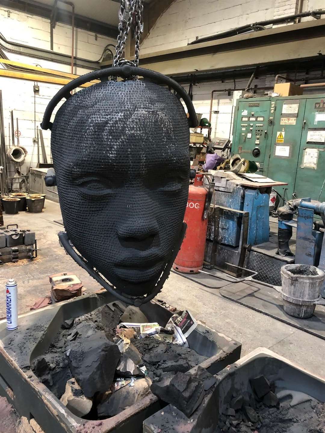 Each head was cast in sections