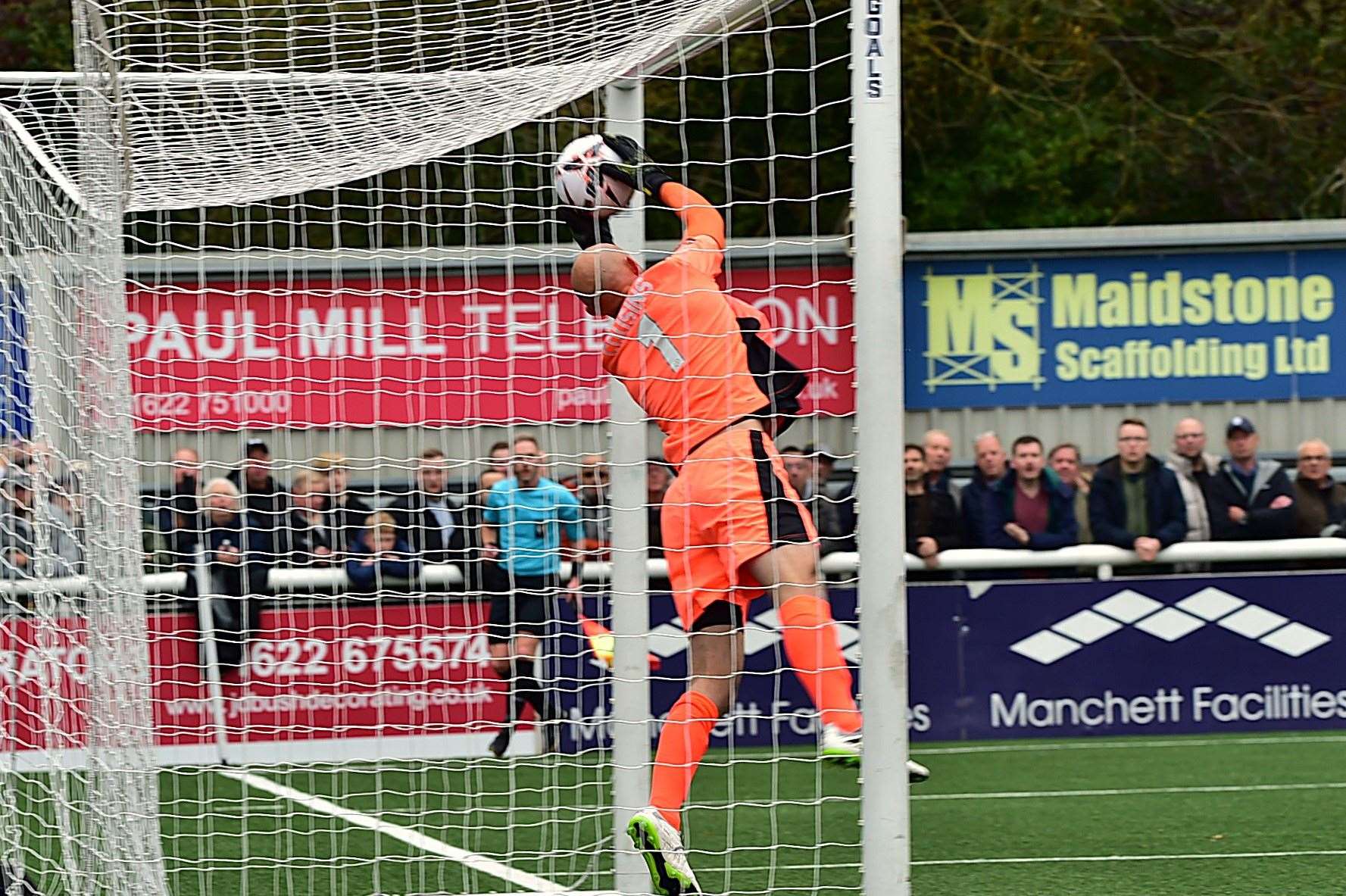 Ebbsfleet goalie Mark Cousins desperately tries to keep out Aaron Blair's early header. Picture: Steve Terrell