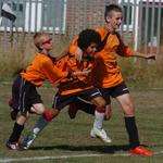 Co-op Sports' Kingsley Dume is congratulated after scoring