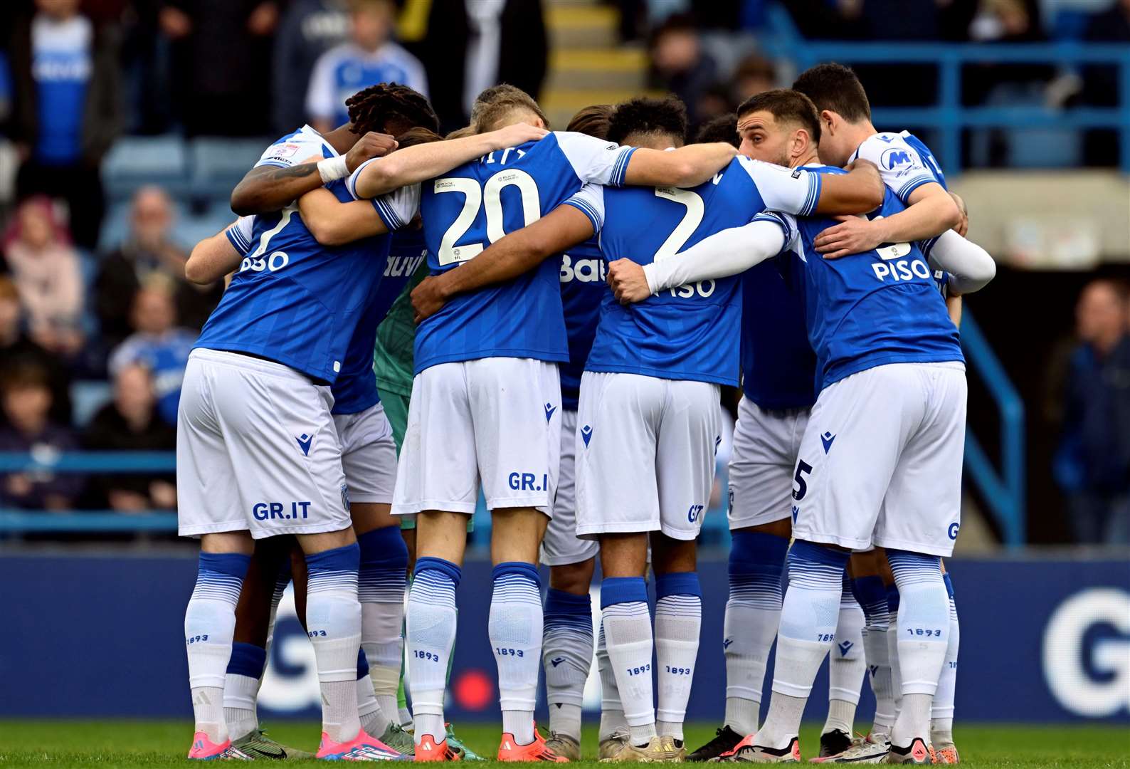 Pre-match huddle – the Gills started joint top of League 2 on Saturday Picture: Barry Goodwin