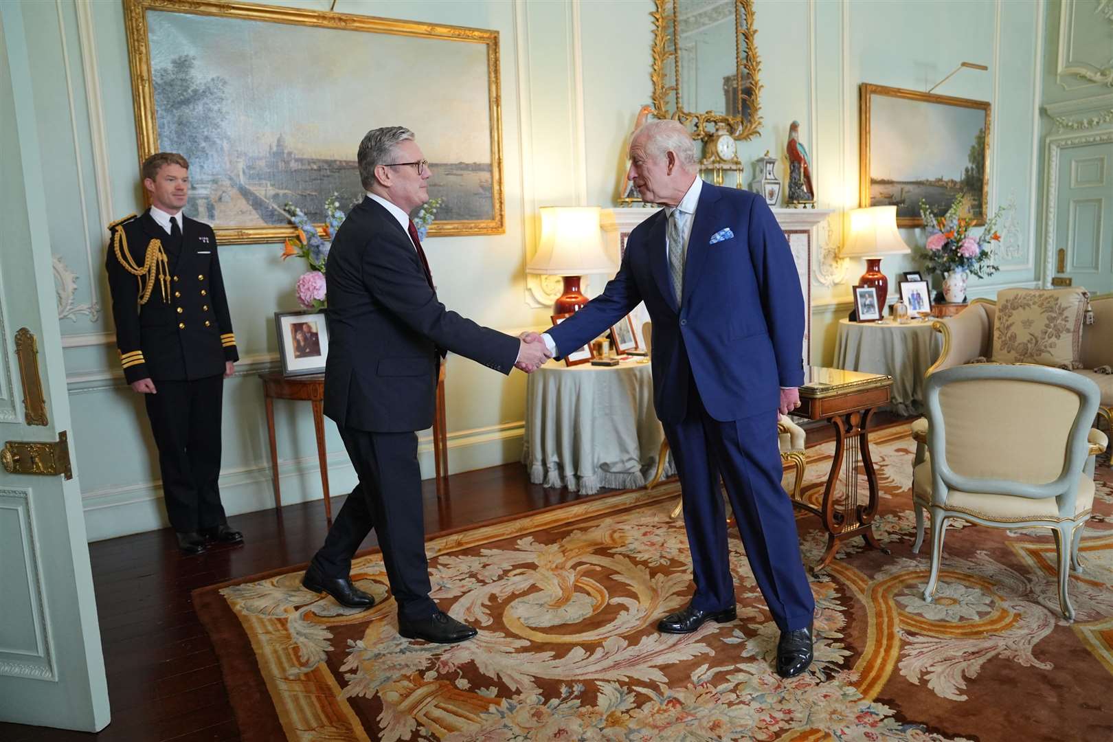 The King welcomes Sir Keir Starmer to an audience at Buckingham Palace on July 5 2024, where he invited the leader of the Labour Party to become Prime Minister and form a new government (Yui Mok/PA)